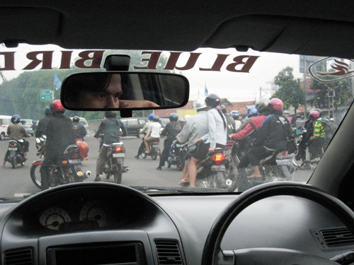 Motorcycles and Taxi.JPG